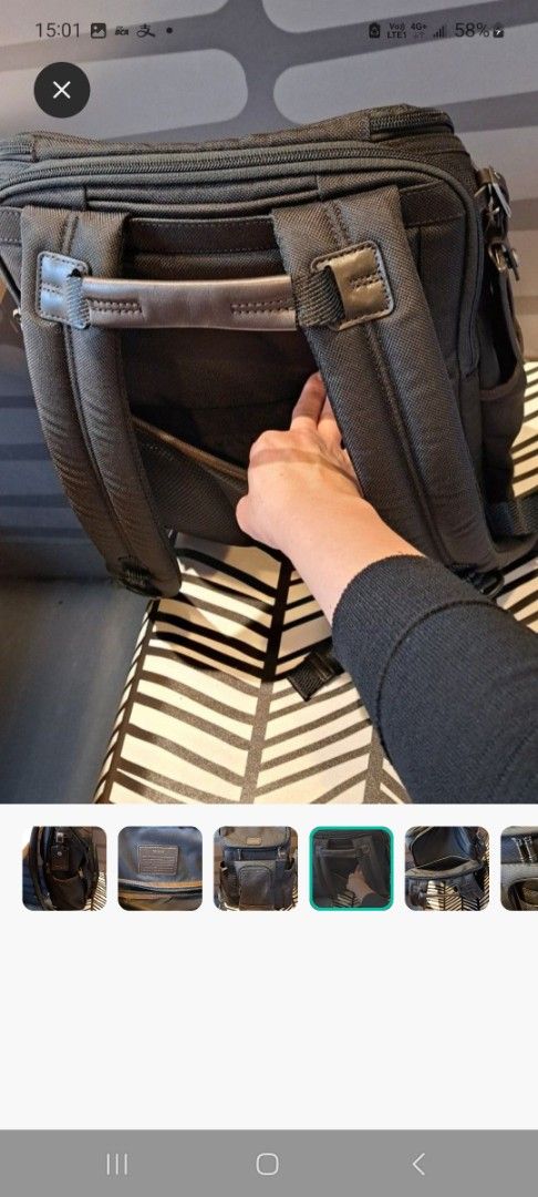 Tumi Backpack （分類：背包）位於 Hong Kong。 由 hhdhg 提交（商品編號 1412915539，圖片 5）。簡介： $1500 Durable Tumi backpack with multiple compartments and pockets. Features a front zip pocket, side pockets, and a spacious main compartment. Includes a top handle and adjustable shoulder straps. The interior has a Tumi label. Made in Vietnam. The backpack has a leather ABAW tag.。