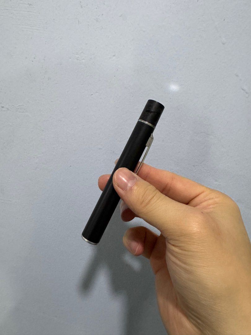 USB Rechargeable Laser Pointer (Category: Other Gadgets) located in Kuala Lumpur. Submitted by charles98978 (Listing ID 1412883246, Image 3). Description: - USB rechargeable laser pointer - Sleek black body with silver clip - Easy button activation - Compact and portable design - Convenient USB charging.