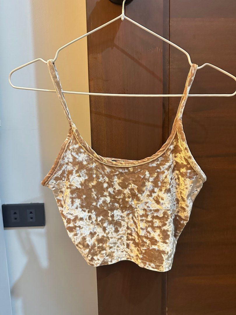 Topshop Velvet Crop Top (Category: Others Tops) located in Manila. Submitted by yotesdg (Listing ID 1412988899, Image 1). Description: - Soft velvet crop top - Light gold color - Thin straps .