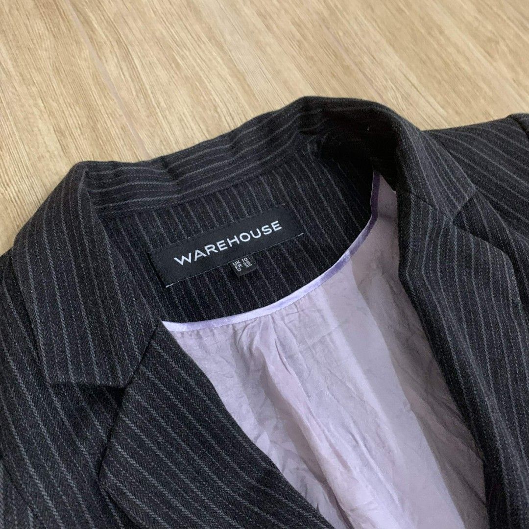 Warehouse Pinstripe Blazer (Category: Coats, Jackets and Outerwear) located in Quezon City. Submitted by reply_1982 (Listing ID 1412903921, Image 2). Description: - Warehouse black pinstripe blazer - Features a single-button closure - Includes two front pockets - Tailored fit - Light purple lining Length: 60cm Chest: 40cm Sleeves: 60cm.