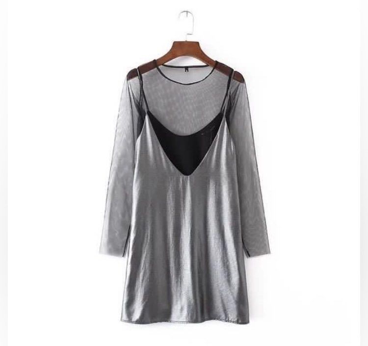 2pc Silver Dress & Black Mesh Coverup (Category: Dresses) located in Pasig City. Submitted by ysavdr14 (Listing ID 1414662445, Image 2). Description: Used only once. Still in excellent condition Perfect for a party or a night out Freesize Can fit Small - Semi Large since it is A shape dress Shipping thru Jnt or Lalamove Gcash or BPI payments .