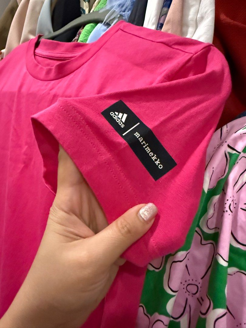 Adidas x Marimekko Dress (Category: Dresses) located in Paranaque City. Submitted by larabnew (Listing ID 1414784097, Image 2). Description: - Adidas x Marimekko collaboration - Eye-catching pink and red color block design - Unique scalloped hem - Classic crew neck and short sleeves - Features Adidas and Marimekko branding on the sleeve .