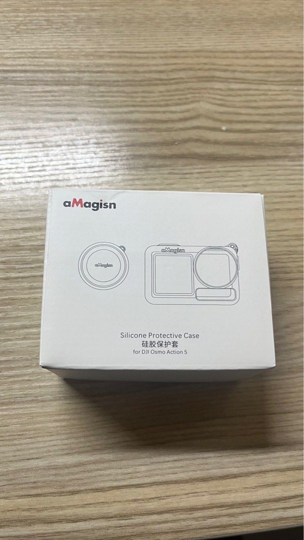 aMagisn Silicone Protective Case for DJI Osmo Action 5 (Category: Camera Bags & Carriers) located in Caloocan City. Submitted by ramonesgia17944 (Listing ID 1414633445, Image 2). Description: - aMagisn silicone protective case for DJI Osmo Action 5 - Includes: silicone case, lens cap, and lanyard - Color: Light gray - Condition: Brand new (Unused) still in original packaging. - Price: Negotiable (414 in Orange app).
