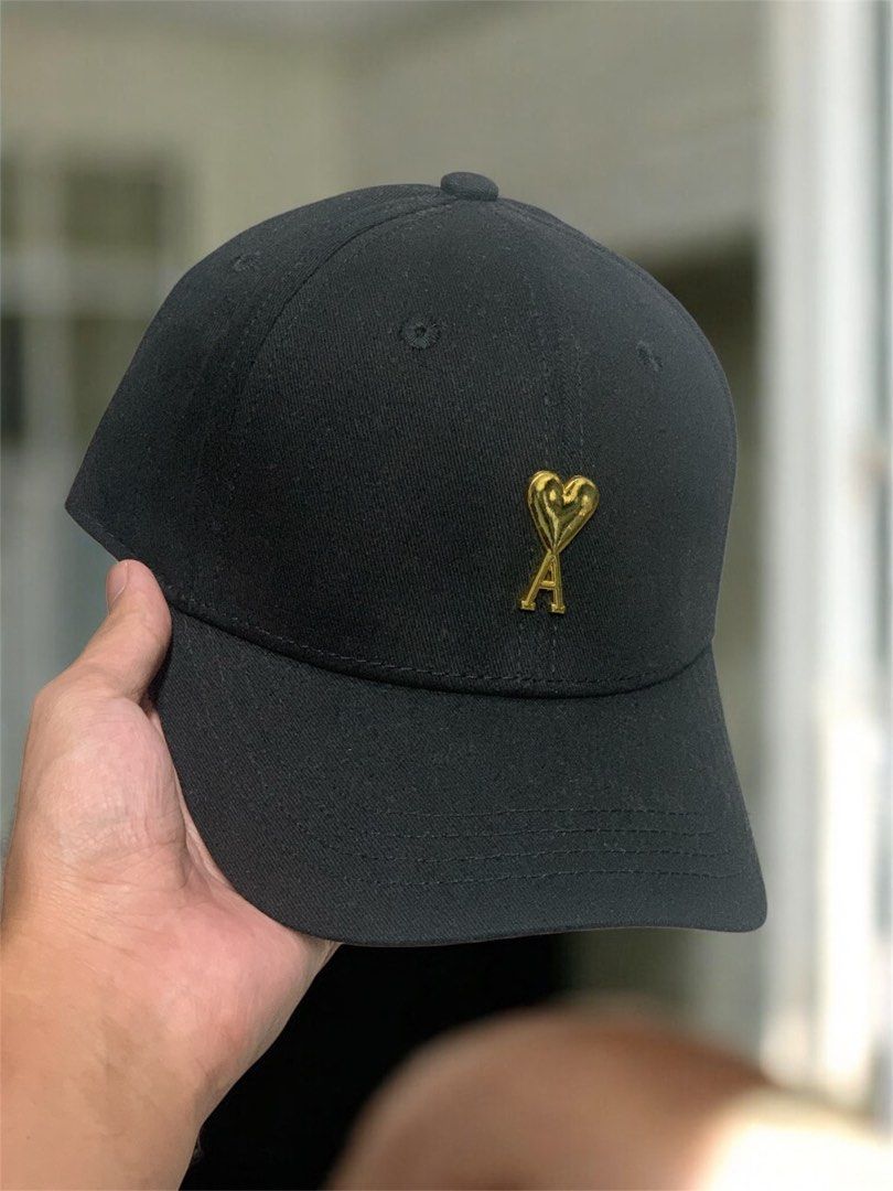 AMI MINIMALIST GOLD LOGO CAP (Category: Caps & Hats) located in Manila. Submitted by scarlett_hope (Listing ID 1414646365, Image 2). Description: 1 SIZE FITS ALL CONDITION: BNEW COLOR RATE: 10/10 MOP: GCASH ONLY COURIER: J&T OR LALAMOVE (PAYMENT FIRST).