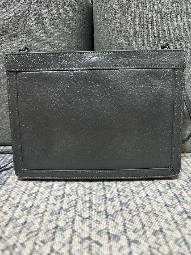 Authentic Balenciaga Pochette Sling (Category: Luxury Bags & Wallets) located in Las Pinas. Submitted by marshmallowmax (Listing ID 1414702113, Image 3). Description: Guaranteed Authentic! Slightly used! Excellent used! No flaws.. Comes with dustbag .