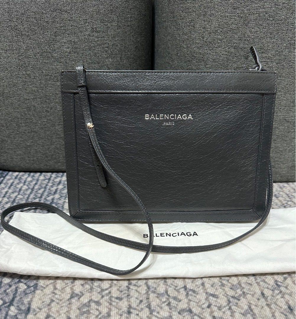 Authentic Balenciaga Pochette Sling (Category: Luxury Bags & Wallets) located in Las Pinas. Submitted by marshmallowmax (Listing ID 1414702113, Image 1). Description: Guaranteed Authentic! Slightly used! Excellent used! No flaws.. Comes with dustbag .
