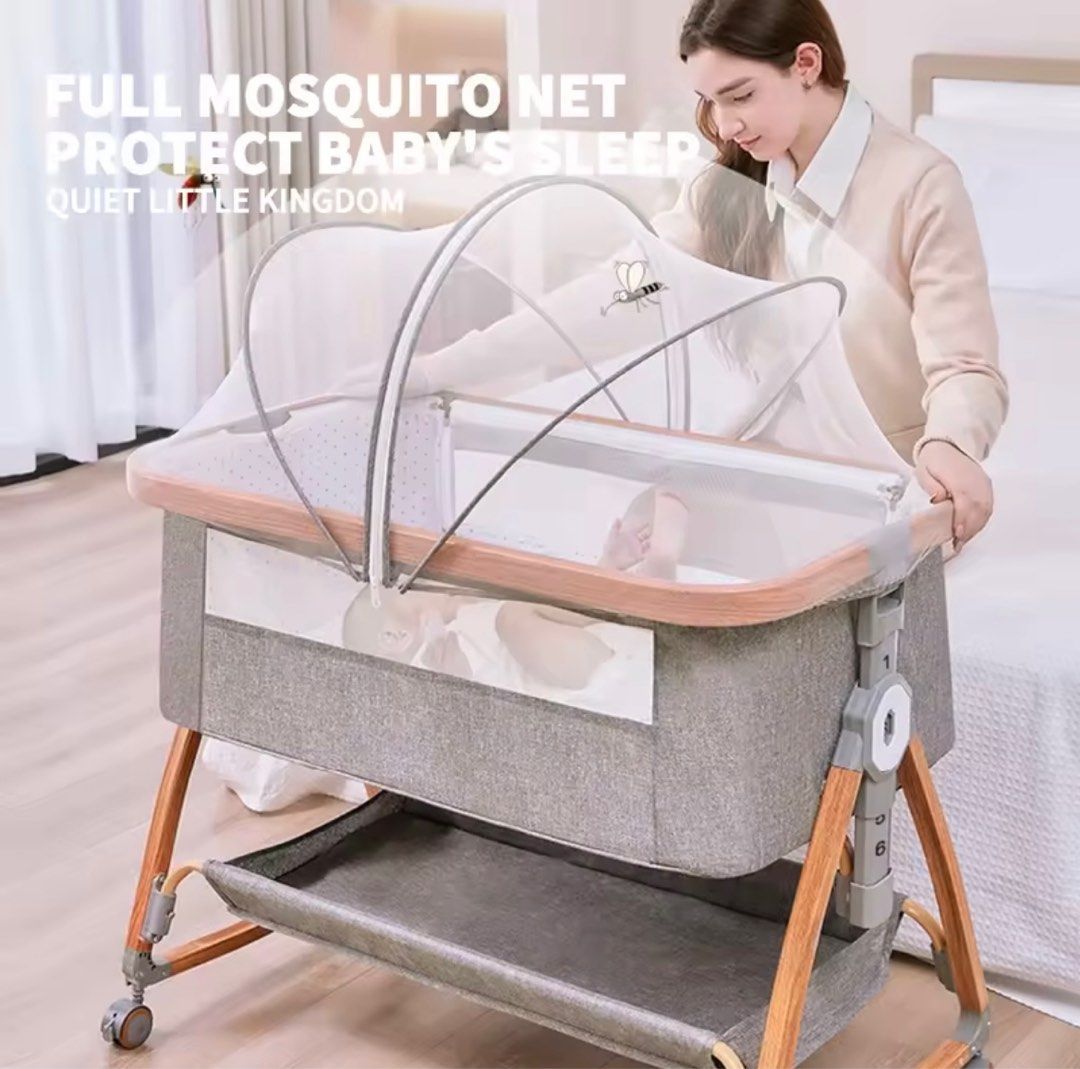 BabeGo Multifunctional Crib (Category: Cots & Cribs) located in Muntinlupa City. Submitted by declutter_with_me (Listing ID 1414645360, Image 2). Description: NO BOX , Assembled Please see actual photos. - High-quality BabeGo crib with mosquito net - Multifunctional design with variable shaker - Features silent wheels and reinforced load-bearing - Six levels of height adjustment - Converts into a shaker with a 5-15 degree rock angle - Includes ma