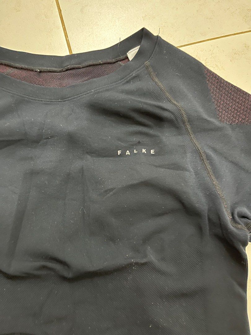 Black FALKE Impulse Running T-shirt (Category: Activewear) located in Pasig City. Submitted by thousandthrift69 (Listing ID 1414817891, Image 2). Description: Color may vary due to lighting No issue / Need wash Excellent Condition 💎 Color rate: 9/10 Size: Large on tag ( M - L fitting ) Dimension: L25.5xW29 - Up Swipe right for more details ⬅️ MINE for only P200❤ + Shipping Message us for inquiries 📩 Follow for more.