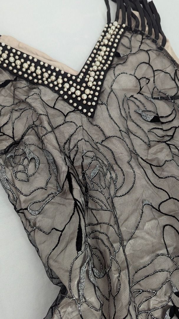 Black Lace Embellished Dress (Category: Dresses) located in Caloocan City. Submitted by dorbueittus (Listing ID 1414762670, Image 2). Description: - Black dress with floral lace overlay - V-neckline with pearl embellishments - Fringe detailing on straps - Pearl-embellished hemline - Neutral-colored lining - Ideal for special events.
