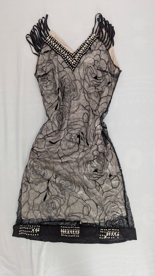 Black Lace Embellished Dress (Category: Dresses) located in Caloocan City. Submitted by dorbueittus (Listing ID 1414762670, Image 1). Description: - Black dress with floral lace overlay - V-neckline with pearl embellishments - Fringe detailing on straps - Pearl-embellished hemline - Neutral-colored lining - Ideal for special events.