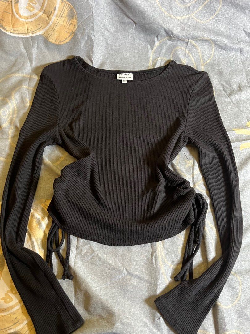 black fitted long sleeve top (Category: Longsleeves) located in Manila. Submitted by a22bee (Listing ID 1414685748, Image 1). Description: - Black long-sleeved top - Ribbed texture - Round neckline - Drawstring details on sides - Flared cuffs - Stretchy material mop: gcash mod: lalamove, angkas padala, jnt - can meet around dlsu.