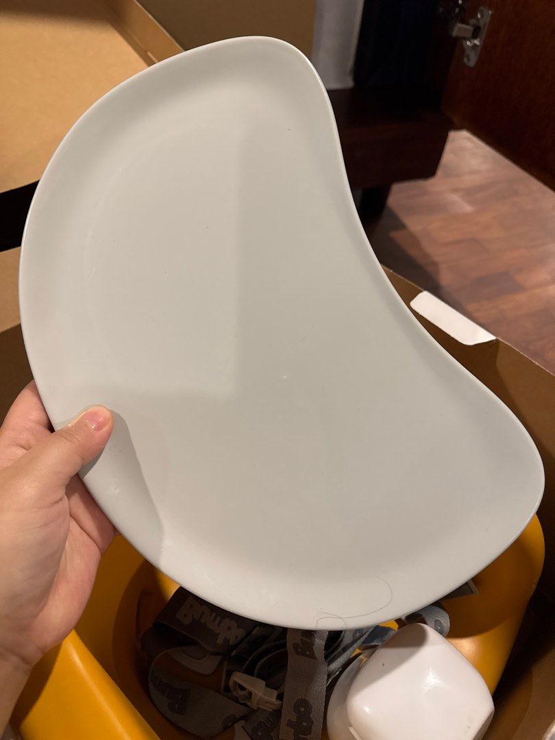 Bumbo Multi Seat (Category: Kids Tables & Chairs) located in Makati City. Submitted by decluttering___ (Listing ID 1414708483, Image 3). Description: - Bumbo Multi Seat for babies aged 6-36 months. - Includes seat, tray, and safety straps. - Features a cheerful yellow and white color scheme. - Designed for multiple stages of use. - Comes in its original box..