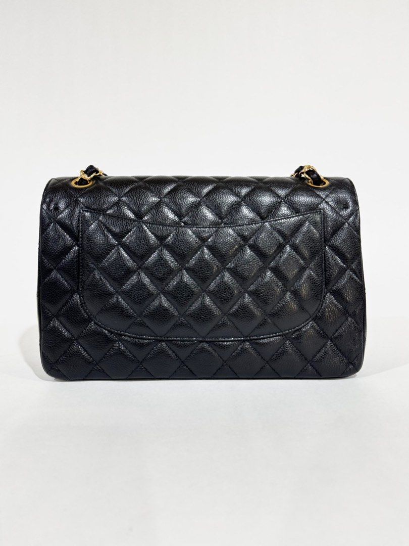 Chanel Classic Double Flap Jumbo Caviar (Category: Luxury Bags & Wallets) located in Pasig City. Submitted by shop_preloved_luxe (Listing ID 1414723885, Image 3). Description: - Authentic Chanel Classic Double Flap - Color: Black - Iconic quilted design - Gold-tone CC turn-lock closure - Interior: Main compartment and zippered pocket - Chain strap with leather detailing - Serial number visible/ Series 29 - Made in Italy RFS: owner is migrating .