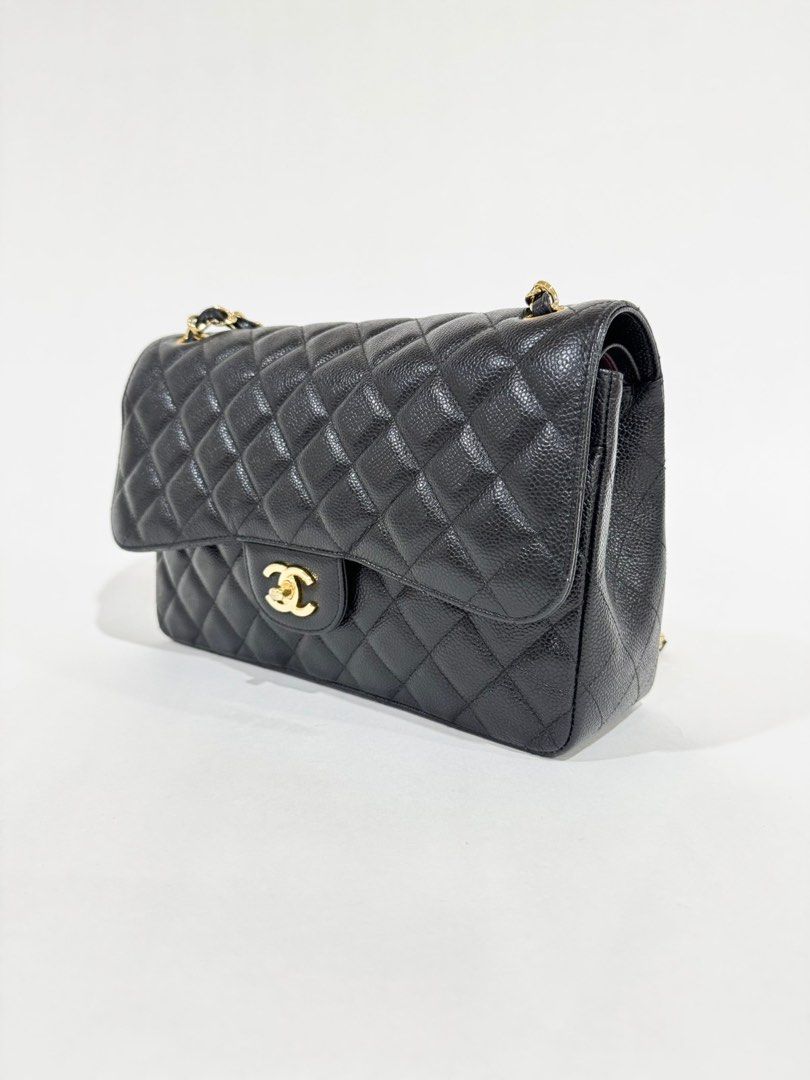 Chanel Classic Double Flap Jumbo Caviar (Category: Luxury Bags & Wallets) located in Pasig City. Submitted by shop_preloved_luxe (Listing ID 1414723885, Image 2). Description: - Authentic Chanel Classic Double Flap - Color: Black - Iconic quilted design - Gold-tone CC turn-lock closure - Interior: Main compartment and zippered pocket - Chain strap with leather detailing - Serial number visible/ Series 29 - Made in Italy RFS: owner is migrating .