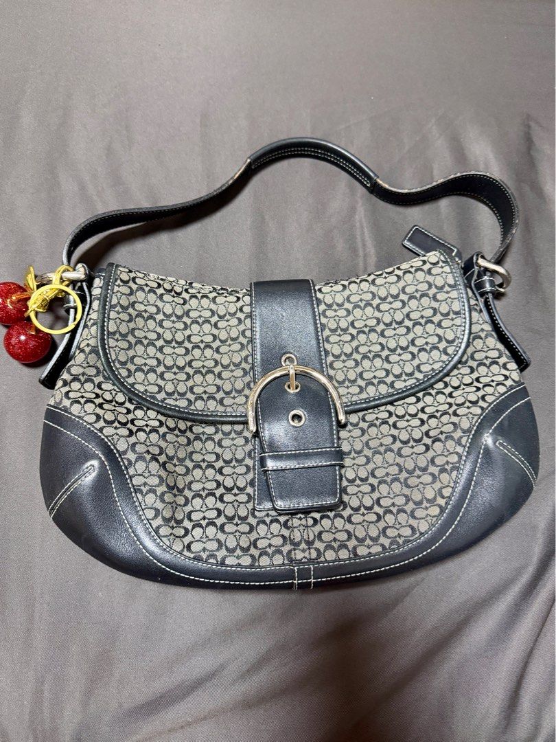 Coach Black Soho Medium (Category: Luxury Bags & Wallets) located in Taguig. Submitted by lakarise (Listing ID 1414687251, Image 1). Description: Medium size Soho Black made in Turkey Minimal signs of usage (Please see last photo) Intact leather pa Cherry charms inlcuded.