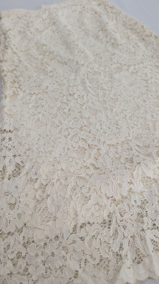 Cream Lace Skirt (Category: Skirts) located in Caloocan City. Submitted by dorbueittus (Listing ID 1414765915, Image 2). Description: - Cream-colored lace skirt - Fitted design - Flared hem - Delicate lace fabric - Perfect for special occasions.