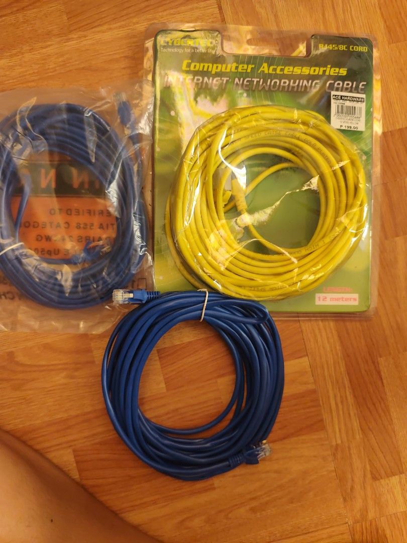 Cybertec Internet Networking Cable (Category: Cables & Adaptors) located in Cavite. Submitted by ms.gel_0522 (Listing ID 1414658576, Image 2). Description: - Includes two blue Ethernet cables - One yellow Cybertec Internet Networking Cable (15 meters) - All cables have RJ45 connectors - Perfect for connecting computers, routers, and other network devices.
