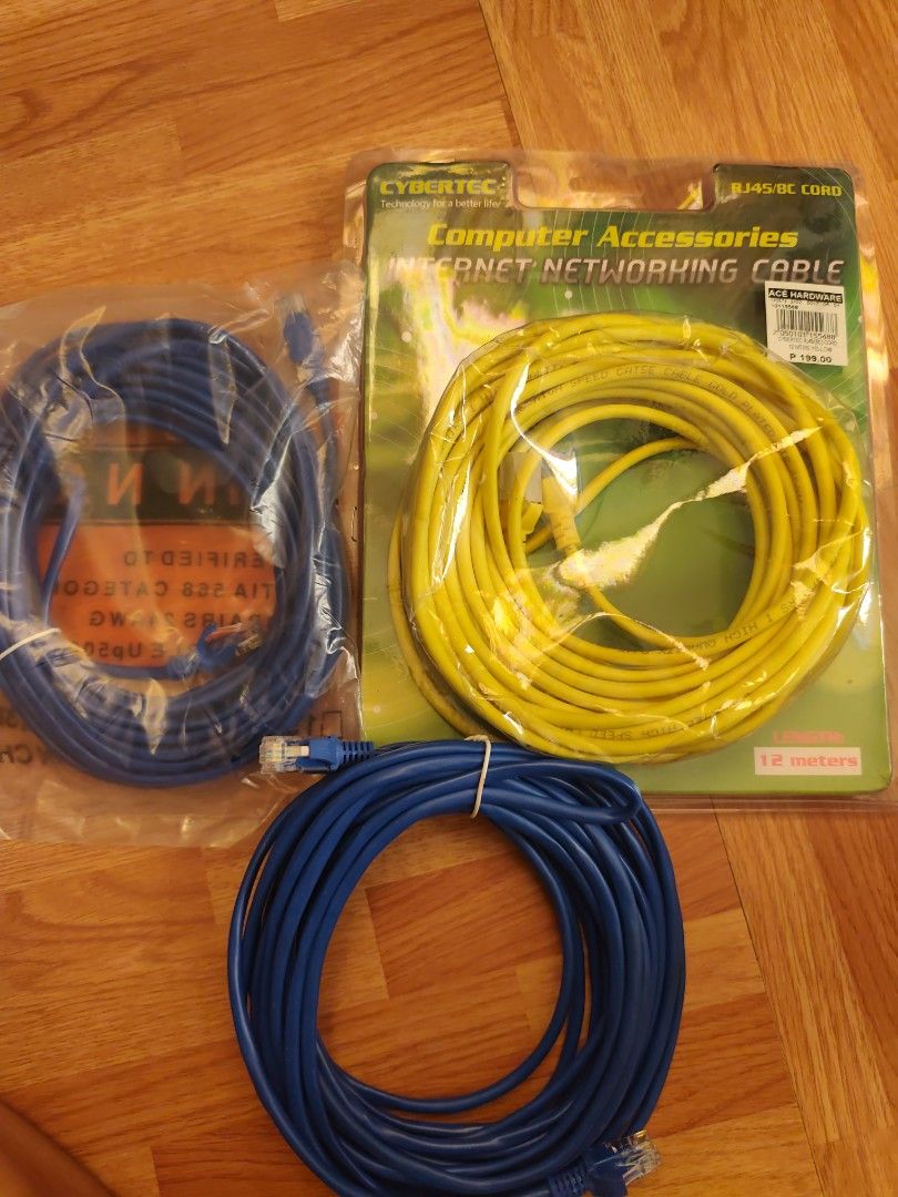 Cybertec Internet Networking Cable (Category: Cables & Adaptors) located in Cavite. Submitted by ms.gel_0522 (Listing ID 1414658576, Image 1). Description: - Includes two blue Ethernet cables - One yellow Cybertec Internet Networking Cable (15 meters) - All cables have RJ45 connectors - Perfect for connecting computers, routers, and other network devices.