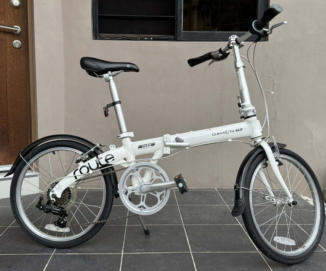 Dahon Route GLO Cloud White Folding Bike (Category: Bicycles) located in Las Pinas. Submitted by coolbear.1cc181 (Listing ID 1414637325, Image 1). Description: - White Dahon Route folding bike - 6-speed Microshift shifter - Includes fenders - Comfortable black seat - Folds for easy storage and transport - Dahon DFS and ViseGrip technology - Route logo on frame *** reasonably negotiable *** Please refrain from inquiring if 'available', it is, as l