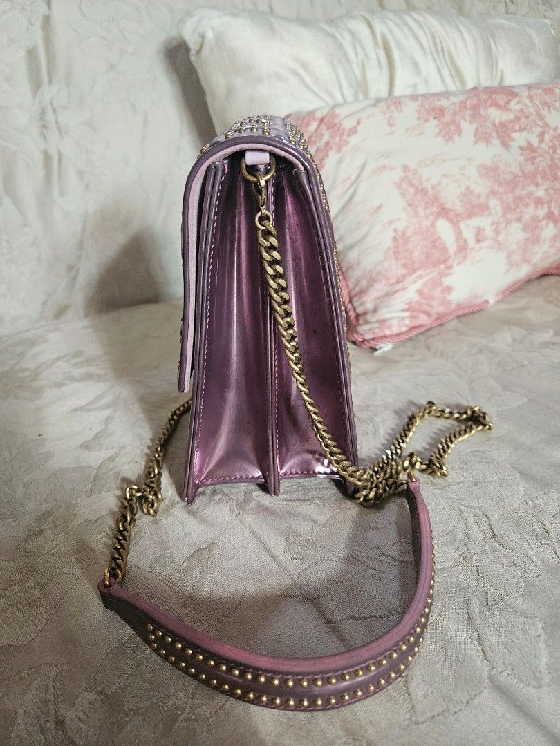 Dior Diorama Vertical Studded Shoulder Bag (Category: Luxury Bags & Wallets) located in Santa Rosa. Submitted by pb_reg (Listing ID 1414639880, Image 2). Description: - Dior shoulder bag - issue on Metallic finish. - Gold-tone studs and chain strap - Suede-like interior lining - Studded shoulder strap FOR TAKE ALL Please see individual posts for more photos 1. Louis Vuitton keepall 55 bandouliere - great condition - minor wear on vachetta - see p