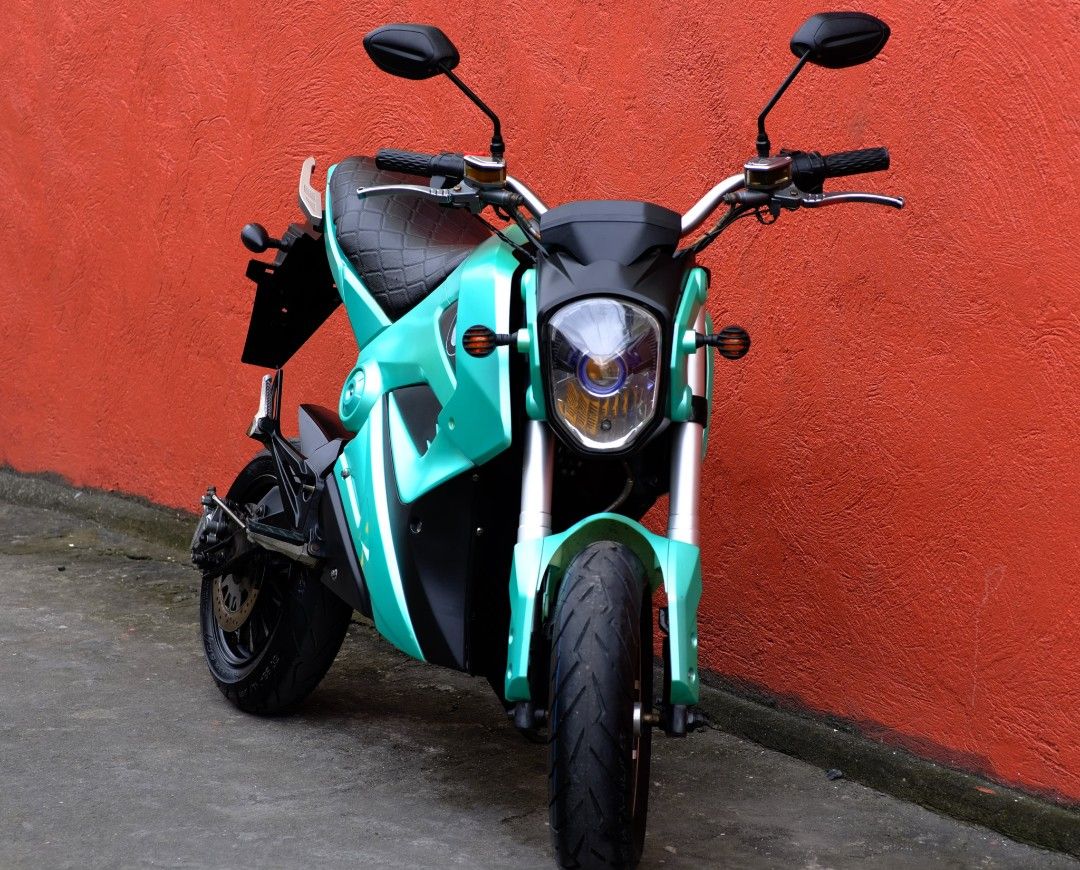 Electric Motorcycle - Teal (Category: Motorbikes for Sale) located in Manila. Submitted by pureforest-c77b (Listing ID 1414687328, Image 2). Description: RUSH SALE! THAILAND EV Bike Z6 – FOR SALE ORIGINAL PRICE: ₱75,000 SELLING PRICE: ₱39,000 (NEGOTIABLE) Condition: Very good | Upgraded Owner: Lady owner Battery Lead-acid battery (brand new) Charging time: ~12 hours Controller Upgraded controller (brand new) Adjustable speed Mas responsive at mas