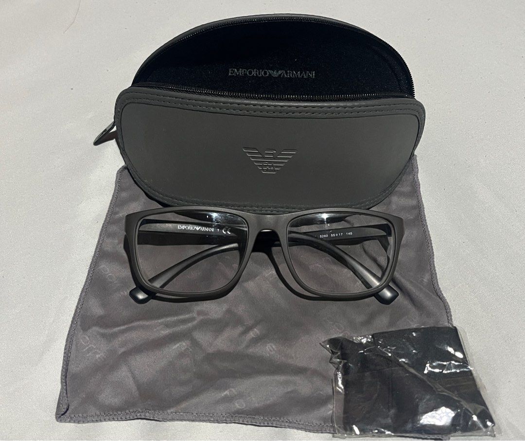 Emporio Armani Eyeglasses EA3091 (Category: Sunglasses & Eyewear) located in Makati City. Submitted by yulrox (Listing ID 1414823508, Image 1). Description: - Emporio Armani eyeglasses - Gray frame - Includes original case - Includes cleaning cloth - Includes small sealed packet - Model: EA3091 - Size: 52-17-145 - Clear lenses - Case features Emporio Armani logo.
