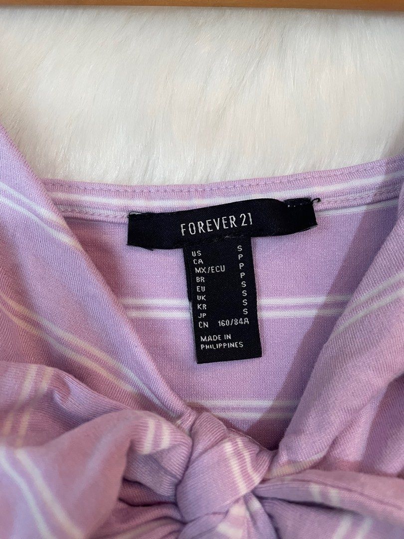 Forever 21 Striped Bodysuit (Category: Others Tops) located in Manila. Submitted by dbbjll (Listing ID 1414797902, Image 2). Description: - Forever 21 bodysuit - Size: Small - Color: Lavender and white stripes - Features: Tie detail at bust, spaghetti straps - Closure: Snap closure.