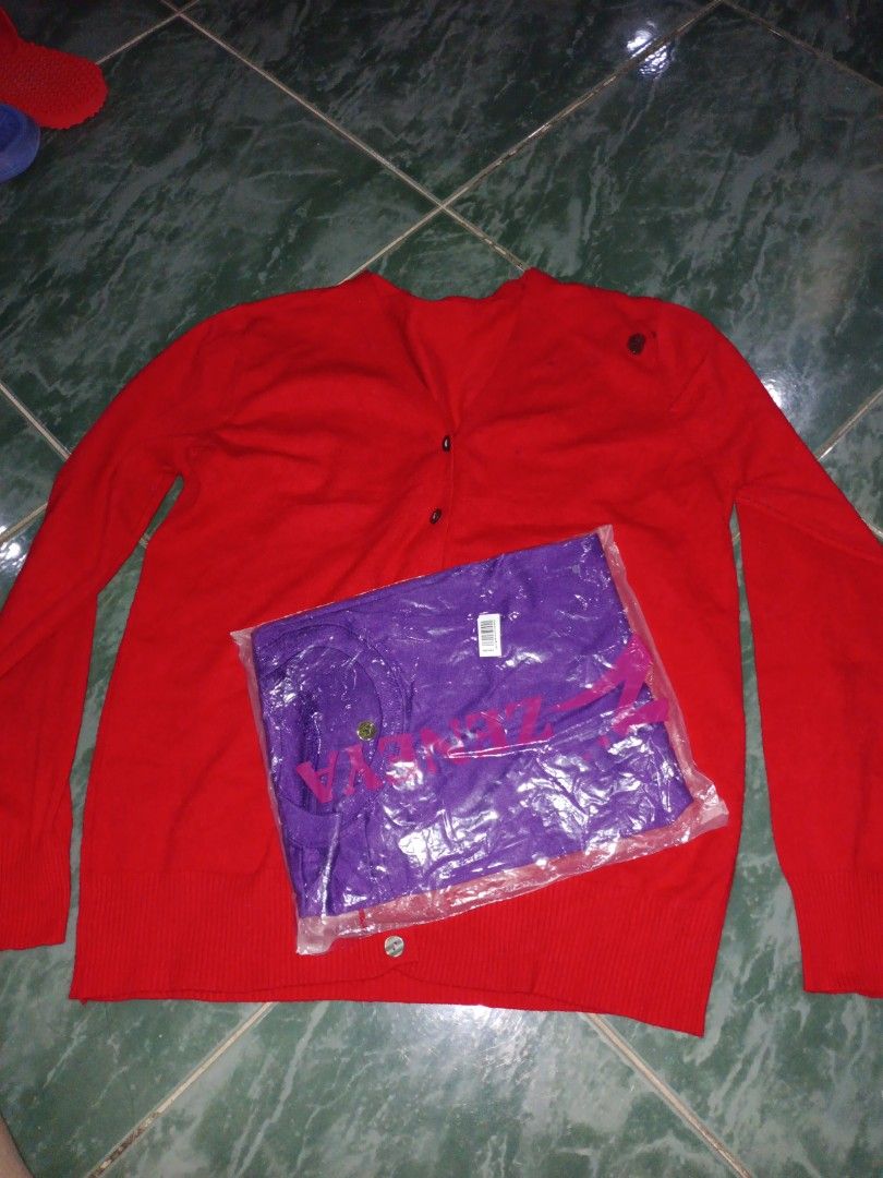 Free S-M Red Cardigan (Category: Coats, Jackets and Outerwear) located in Cebu City. Submitted by aky_deee (Listing ID 1414735080, Image 2). Description: 🌸If you buy any from my listing, I will include this as a freebie y'all 🌸FLAW: only the stain on the upper right corner, see the pic 🌸Will also include the violet XS shirt.