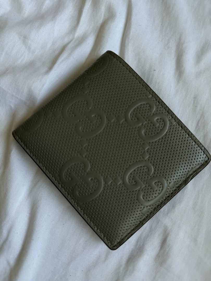 Gucci Wallet (Category: Wallets & Card Holders) located in Taguig. Submitted by drelo (Listing ID 1414794831, Image 1). Description: 💯authentic Complete with original box, paperbag, dust bag, and store receipt Cement gray Actual model in photos.