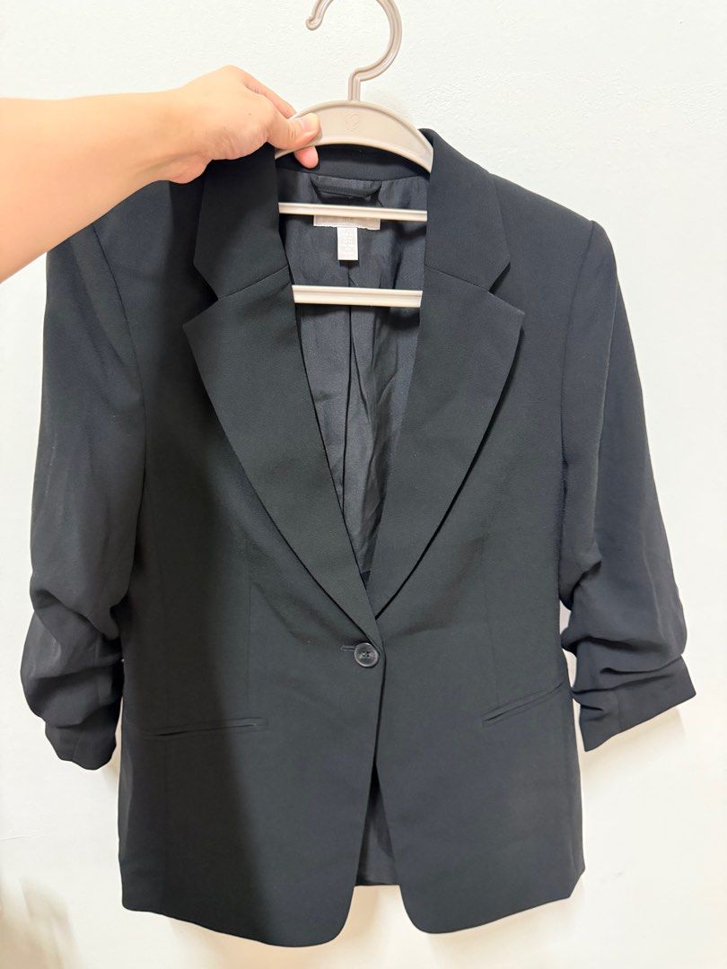 H&M Black Blazer with 3/4 Sleeves (Category: Coats, Jackets and Outerwear) located in Cainta. Submitted by boncanini (Listing ID 1414730383, Image 1). Description: - H&M black blazer - Single-button closure - 3/4 sleeves - Classic lapel design - Tailored fit - Smooth, solid fabric - Ruched sleeves.