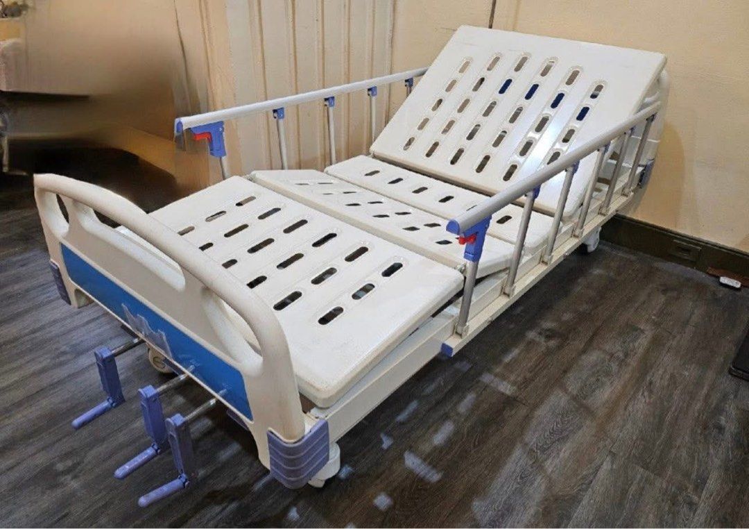 Hospital Bed - Three Cranks (Category: Bed Frames & Mattresses) located in Rizal. Submitted by artandjournals (Listing ID 1414637203, Image 3). Description: For sale: Three-Cranks Hospital Bed (Used Condition) Adjustable head and feet side, adjustable height. With side rails, and food table. May sabitan nang IVs Thick mattress, unlike sa nabibili sa labas. Note: Already assembled. Needs three to four people to carry out of our home. Used conditio