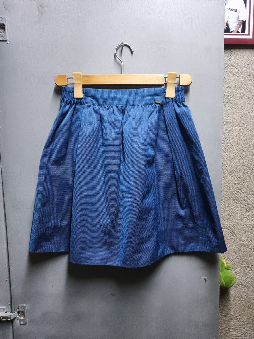 Initialer Blue Skirt (Category: Skirts) located in Dasmarinas. Submitted by jessputrages (Listing ID 1414806625, Image 1). Description: - Initialer blue pleated skirt - Elastic waistband - Maroon dotted inner lining - Material blend - Size not specified.