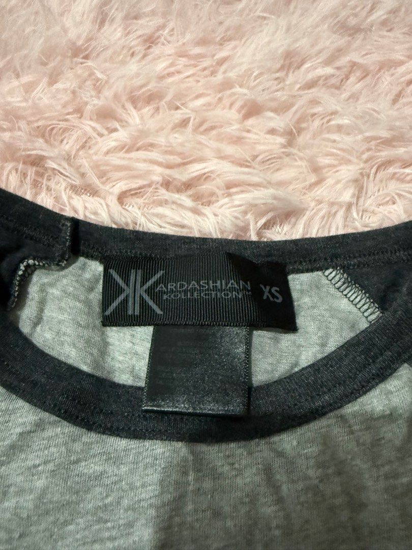 Kardashian Kollection Long Sleeve XS (Category: Longsleeves) located in Quezon City. Submitted by laistyle (Listing ID 1414739783, Image 2). Description: - Kardashian Kollection raglan shirt - Size: XS - Colors: Gray and dark gray - Design: Graphic on front - Features: Long sleeves, crew neck - Material: Soft - Perfect for casual wear.