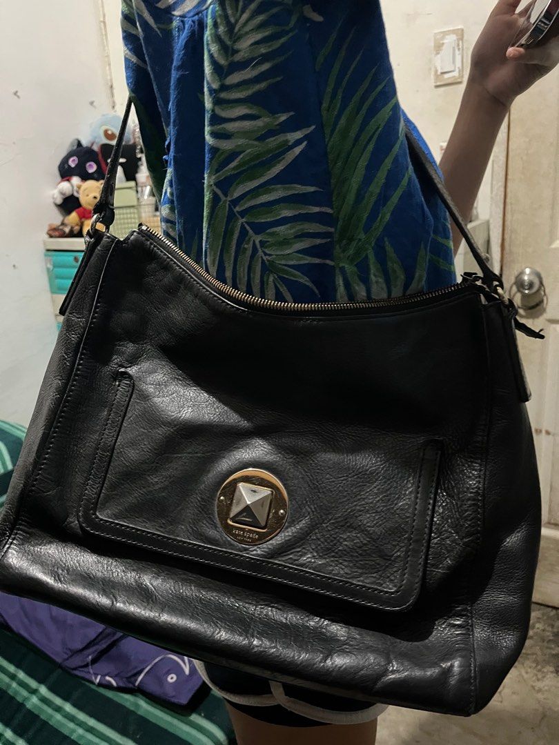 Kate Spade Black Shoulder Bag (Category: Luxury Bags & Wallets) located in Las Pinas. Submitted by tickya (Listing ID 1414715156, Image 1). Description: - Kate Spade shoulder bag - Color: Black - Closure: Flap with gold-tone accent - Additional Closure: Top zipper - Strap: Shoulder strap - Material: Textured leather - Exterior: Front pocket.