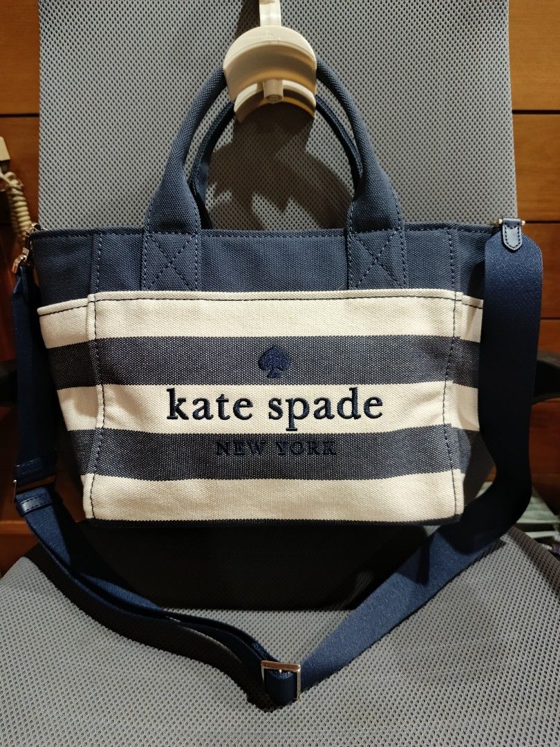 Kate Spade Jett Tote Bag (2 way) (Category: Tote Bags) located in Quezon City. Submitted by home_declutters (Listing ID 1414752772, Image 1). Description: Type: Top Handle/Shoulder/Crossbody Bag Size: 11.4 X 8.75 X4.6 inches - Adjustable Shoulder Strap, (max 22 inches Drop) - Handle Drop: 4.5 inches Material: - Cotton Canvas with smooth leather trim - Top Zip Closure - Canvas Lining - Embroidered Logo Interior: - Back Zip Pocket Exterior: Side Sl