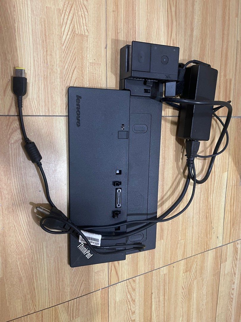 Lenovo ThinkPad Docking Station (Category: Laptops & Notebooks) located in Manila. Submitted by tomtomsworld (Listing ID 1414795529, Image 1). Description: - Lenovo ThinkPad docking station - Includes power adapter and cable - Features multiple ports - Comes with a ThinkPad branded base - Black color.
