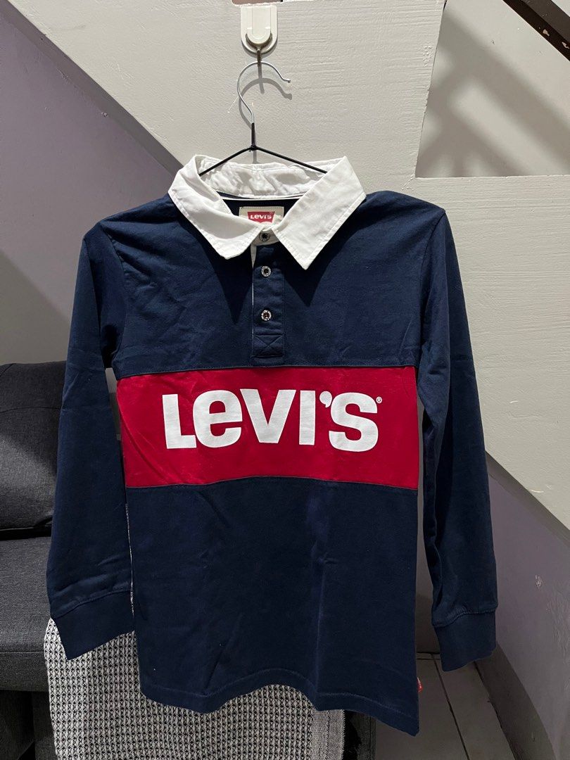 Levi's Rugby Shirt (Category: Babies & Kids Fashion) located in Angono. Submitted by dubibo (Listing ID 1414694181, Image 1). Description: Levi’s long-sleeve color-block rugby polo shirt in navy and red cotton.
