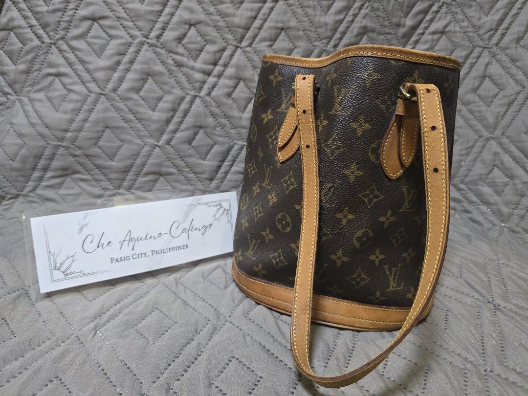 Louis Vuitton Bucket Bag PM (Category: Luxury Bags & Wallets) located in Manila. Submitted by lylmaster (Listing ID 1414799981, Image 2). Description: - Authentic Louis Vuitton bucket bag - Classic monogram canvas - Vachetta leather trim (with cracks and heavy watermark) - Leather-reinforced base.