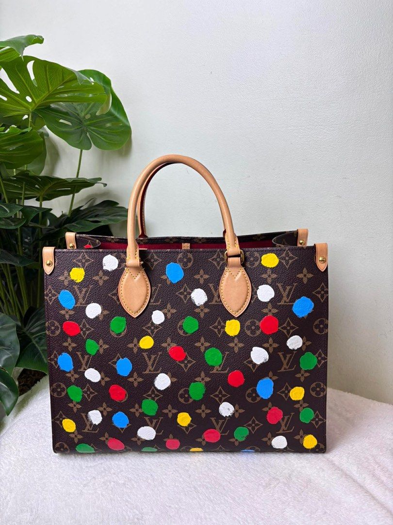 Louis Vuitton OTG MM (Category: Luxury Bags & Wallets) located in Mandaluyong City. Submitted by autumndei (Listing ID 1414743785, Image 1). Description: - Authentic Louis Vuitton OTG tote bag - Yayoi Kusama - Tan leather handles and trim - Red fabric interior lining - Includes a zippered pocket - Spacious interior, ideal for daily use - with dustbag.