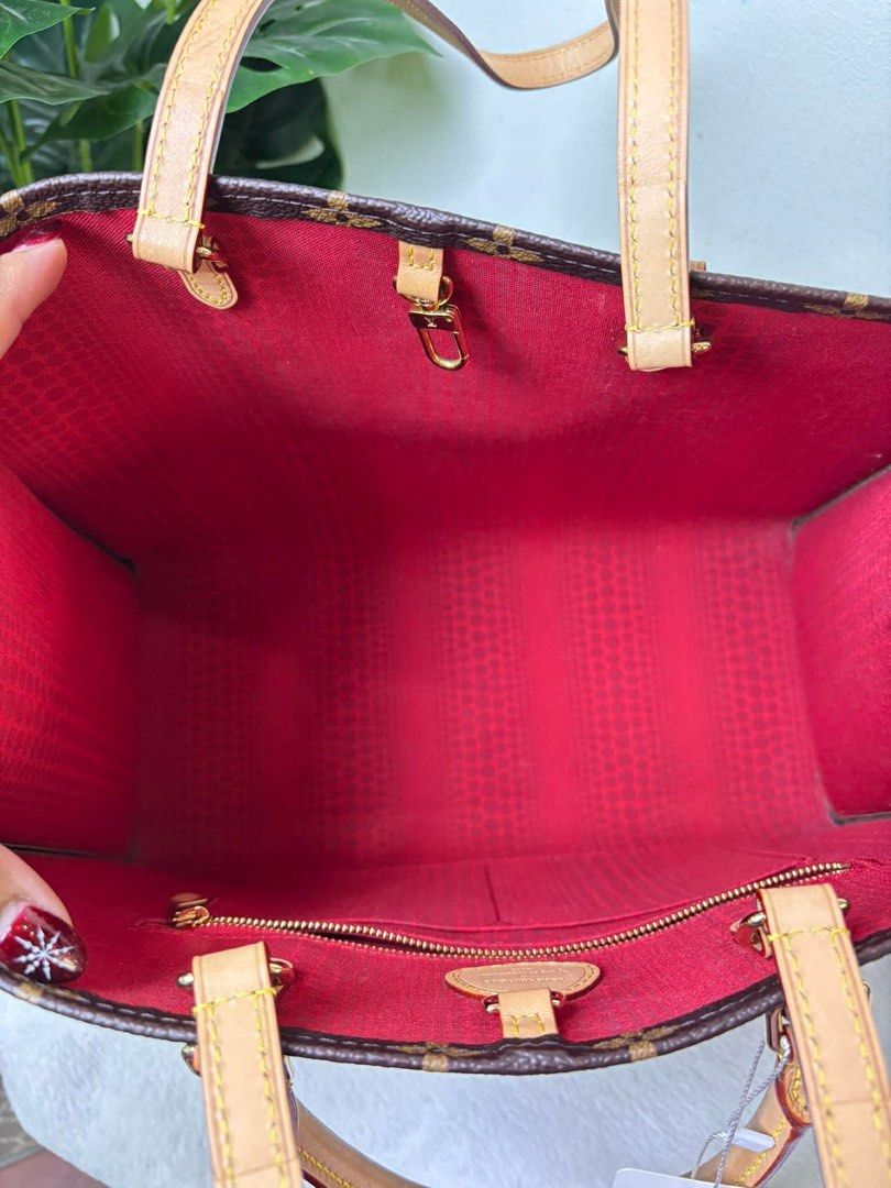 Louis Vuitton OTG MM (Category: Luxury Bags & Wallets) located in Mandaluyong City. Submitted by autumndei (Listing ID 1414743785, Image 2). Description: - Authentic Louis Vuitton OTG tote bag - Yayoi Kusama - Tan leather handles and trim - Red fabric interior lining - Includes a zippered pocket - Spacious interior, ideal for daily use - with dustbag.