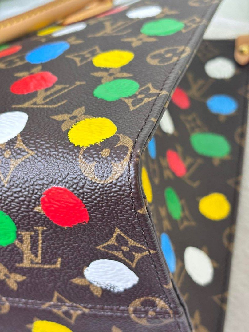 Louis Vuitton OTG MM (Category: Luxury Bags & Wallets) located in Mandaluyong City. Submitted by autumndei (Listing ID 1414743785, Image 3). Description: - Authentic Louis Vuitton OTG tote bag - Yayoi Kusama - Tan leather handles and trim - Red fabric interior lining - Includes a zippered pocket - Spacious interior, ideal for daily use - with dustbag.