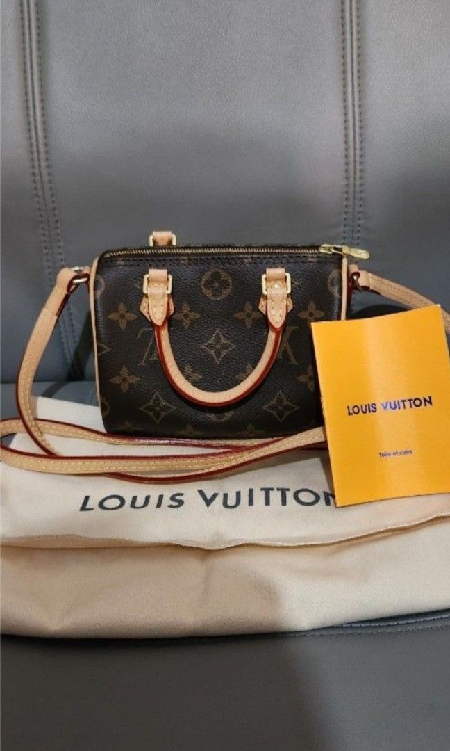 Louis Vuitton Nano Speedy (Category: Luxury Bags & Wallets) located in Mabini. Submitted by wearandcarry (Listing ID 1412328575, Image 2). Description: - Authentic declared Louis Vuitton Nano Speedy handbag - Iconic Monogram canvas - shoulder strap - Rolled leather handles - Top zip closure - Spacious interior - Ideal for everyday or special use.