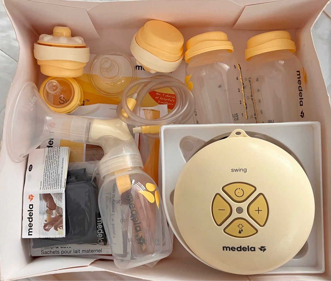 Medela Swing Pump & Feed Set (Category: Breastfeeding & Bottle Feeding) located in Muntinlupa City. Submitted by declutter_with_me (Listing ID 1414627542, Image 3). Description: Medela Swing Pump & Feed Set. Includes a single electric 2-Phase breast pump, bottles, teats, and breast milk storage bags. Also includes Quick Clean bags, and instructions. The set is designed to pump, store, feed, and clean. The pump features a Calma feeding solution..