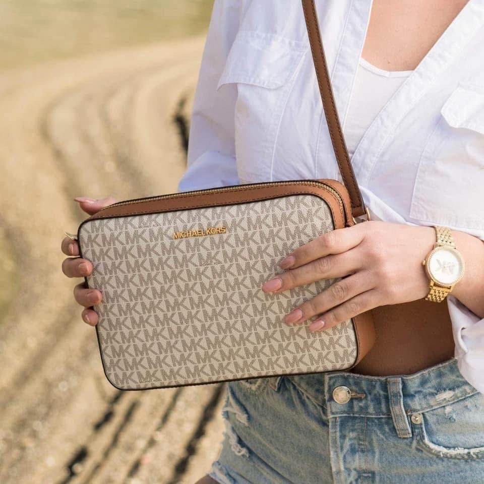 MK sling bag monogram white (Category: Luxury Bags & Wallets) located in San Mateo. Submitted by dona0210 (Listing ID 1315388758, Image 2). Description: Authentic MK monogram sling bag. White in color. From US. no inclusion. No dustbag. .