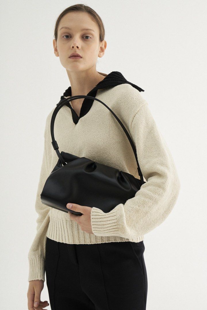 MUNIÉR Shoulder Bag - Black (Category: Luxury Bags & Wallets) located in Bayambang. Submitted by elle.declutter (Listing ID 1414796237, Image 2). Description: MUNIÉR Pleats Shoulder Bag - BLACK 9/10 (See last few slides for the actual photo w its minimal flaws) Orig price: $92 or ₱5,450.00.