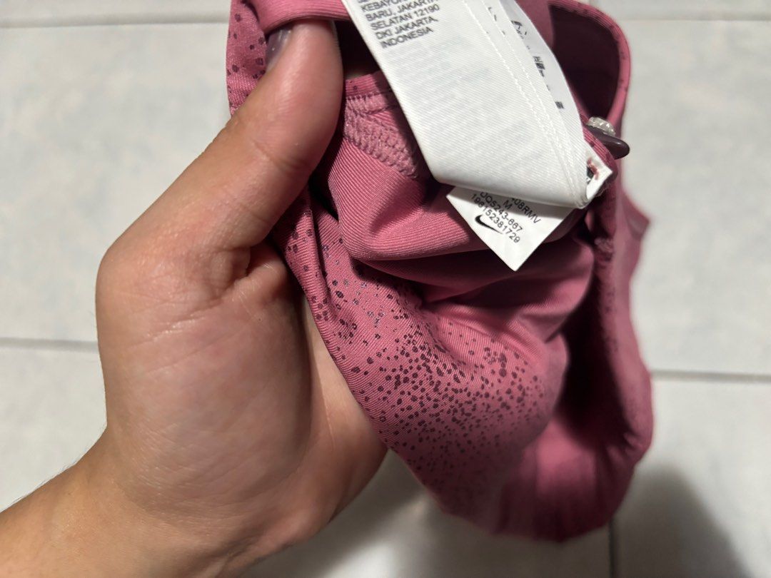 NIKE ASYMMETRICAL SPORTS BRA (Category: Activewear) located in Manila. Submitted by lovesport (Listing ID 1414735360, Image 3). Description: PADDED MEDIUM.