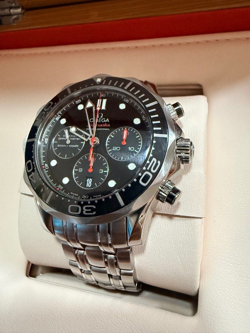 Omega Seamaster Diver 300M Chronograph (Category: Men's Watches) located in Paranaque City. Submitted by greesey3 (Listing ID 1414641324, Image 1). Description: For sale or trade - Omega Seamaster Diver 300M Chronograph - Black dial - Stainless steel bracelet - Includes original box, service and warranty receipt from omega, and operating instructions - Chronograph subdials - Date display - Presented in original wooden box.