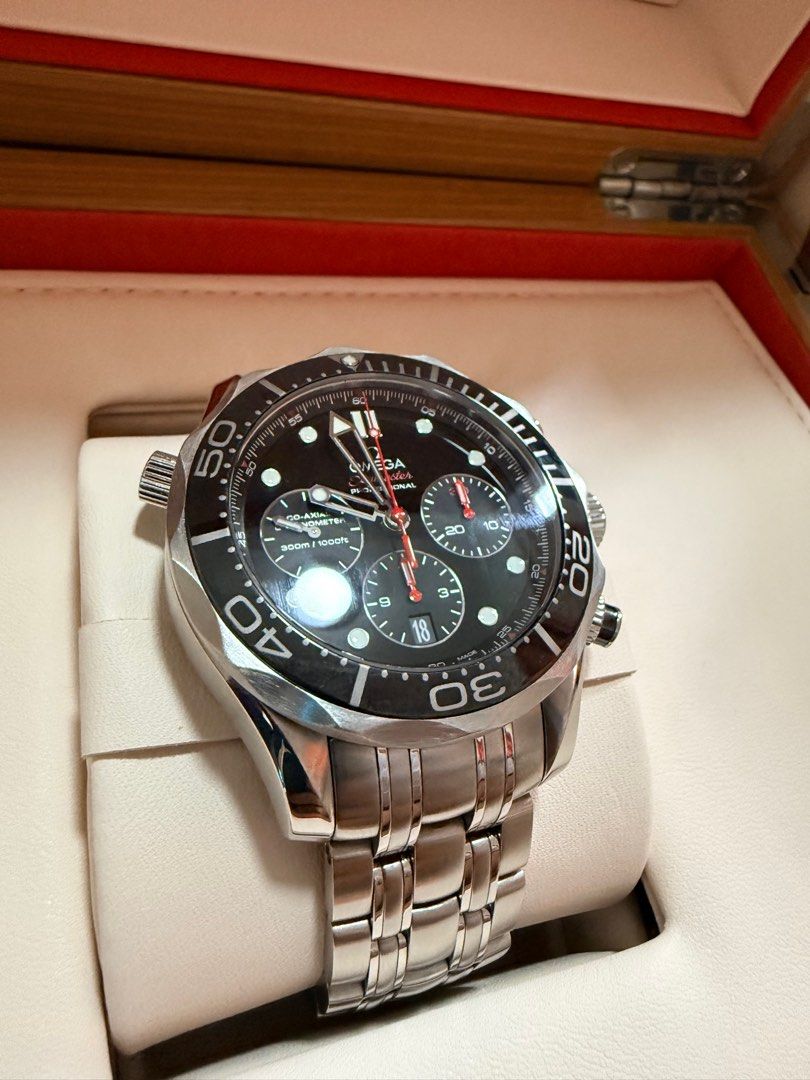 Omega Seamaster Diver 300M Chronograph (Category: Men's Watches) located in Paranaque City. Submitted by greesey3 (Listing ID 1414641324, Image 2). Description: For sale or trade - Omega Seamaster Diver 300M Chronograph - Black dial - Stainless steel bracelet - Includes original box, service and warranty receipt from omega, and operating instructions - Chronograph subdials - Date display - Presented in original wooden box.