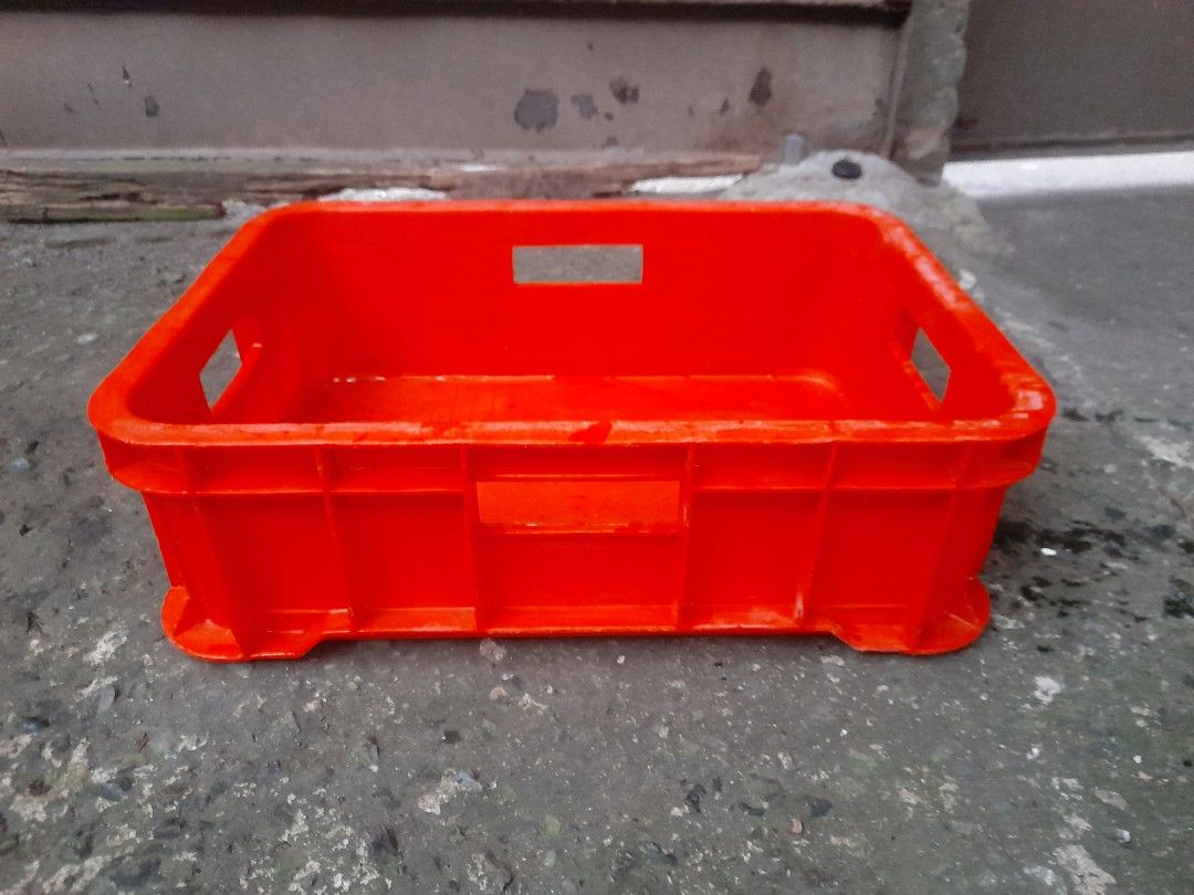 Orange Plastic Storage Box with Handles (Category: Storage Boxes & Baskets) located in Valenzuela. Submitted by newbear.425b6e (Listing ID 1414726747, Image 3). Description: - Durable orange plastic storage box - Built-in handles for easy carrying - Rectangular shape with grid pattern - Smooth interior and sturdy base - Ideal for home or workspace organization -surplus plastic crate 400 each.