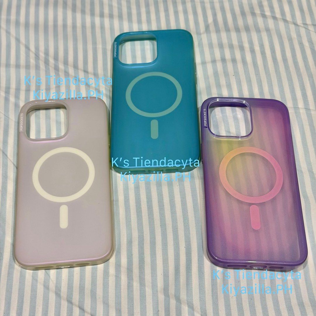ORIG** POPSOCKETS Case iPhone 15 Pro Max (Category: Cases & Sleeves) located in Bocaue. Submitted by kiyazilla.ph (Listing ID 1414713881, Image 1). Description: ❕𝙊𝙍𝙄𝙂𝙄𝙉𝘼𝙇 / 𝘼𝙐𝙏𝙃𝙀𝙉𝙏𝙄𝘾 ❕ 📱Pop Sockets Case 📱 Unit: iPhone 15 Pro Max Colors available: 🤍 opalescent white -ay pagka rainbow~ish effect sa color pag natatamaan ilaw in different angles 🩵 opalescent blue - light blue~ish 💜 aura purple - ito not more than 5 times ko lag 